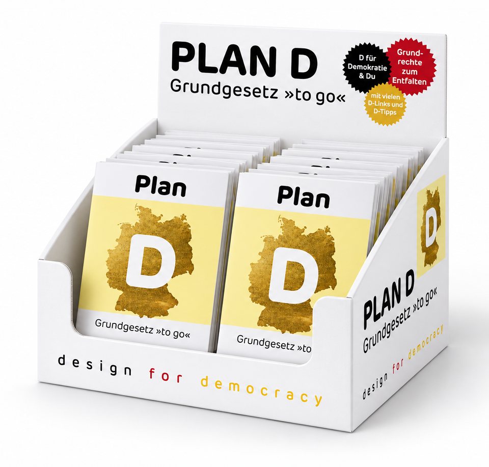 Thekendisplay PLAN D – Grundgesetz „to go“, zwei Reihen Hefte mit goldener Deutschlandkarte